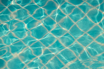 Fototapeta na wymiar Reflect the waves and in the blue pool background