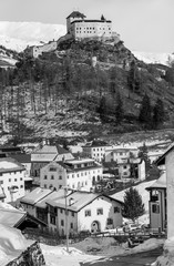 Black and white view of the village of Tarasp in winter