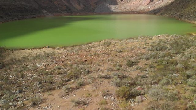fly over the green lake smooth and tilt