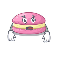 A picture of strawberry macarons having an afraid face