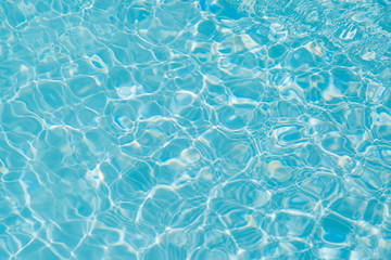 Blue water ripple reflection in the swimming pool