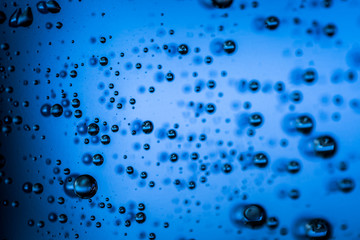Water droplets on blue