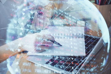 International business hud over woman's hands writing background. Concept of hard work. Double...