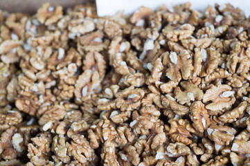 Peeled walnuts. Background. The view from the top at an angle