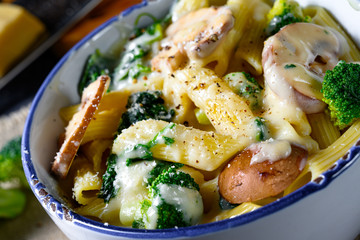 Real pasta with mushrooms, spinach and broccoli