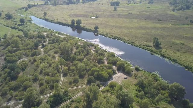 Aerial summer view to Desna river and forest