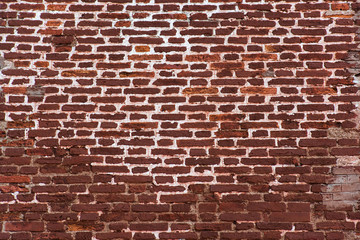 Red light vintage brick wall with rough surface