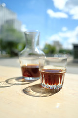 Stylish served specialty alternative black coffee. Filter pour-over coffee served in crystal glass and decanter. Aesthetics coffee