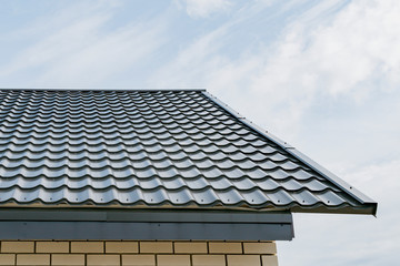 Fototapeta na wymiar Metal roof of a new private house