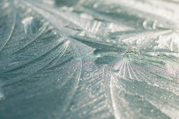 The metal surface is covered with frozen frost