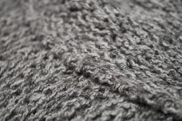 Closeup of grey woolen pullover texture
