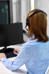 business, people and technology concept - businesswoman or helpline operator with headset and...