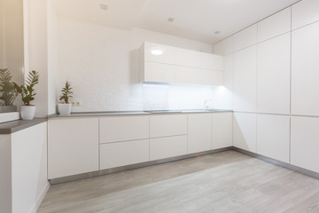 interior design of clean modern white kitchen