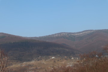 mountains lit by the day sun