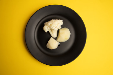 cooked cauliflower dish with potatoes