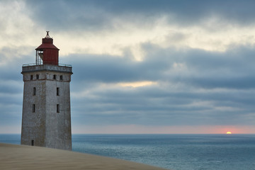Fototapeta na wymiar Lighthouse at sunset