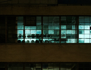 Factory Window at Night