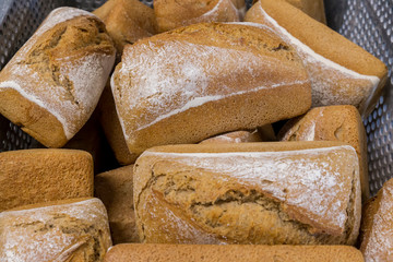 A pile of recently baked bread loafs