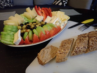 vegetable and cheese salad served on a white plate
