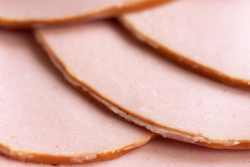 Slices of a tasty boiled sausage macro