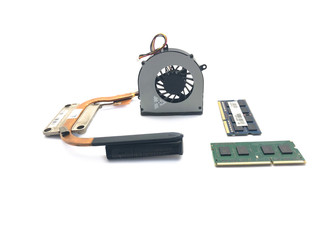 Fan and cooling system for laptop isolated on a white background. Fan for cooling system. Copper tubes of the cooling system.