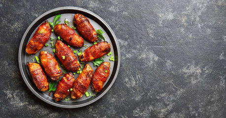 Bacon wrapped grilled chicken wings