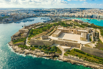 Aerial panorama view of Fort Manoel on Manoel island, Gzira city. Blue sky and clouds. Malta island