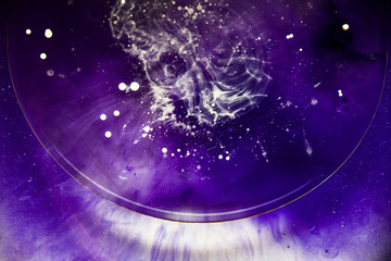 Beautiful abstraction in shades of blue and purple of liquid paints © dominikab