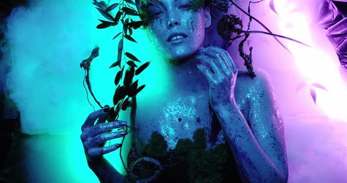 Beautiful high fashion model, cosplay avatar girl lies among the magical fog in the forests of the planet Pandora in neon colors and beautiful glows, shot in 4K close-up, bright and saturated
