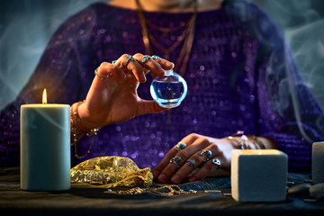 Witch woman using magical elixir potion bottle for love spelling, witchcraft, divination and...