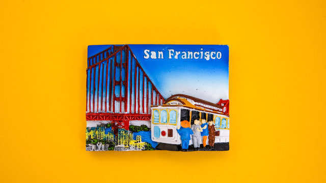 San francisco magnet on yellow background , golden gate bridge, travel concept