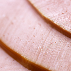 Slices of a tasty boiled sausage macro