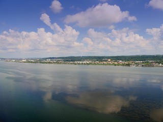 Aerial view of Potomac River with Washington, D.C. waterfront in the distance.