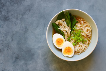 Vegan ramen soup with mushrooms and spinach. Asian cuisine
