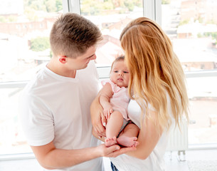 Fototapeta premium Couple with baby
