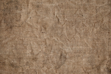 Light brown natural linen texture for the background. Close up