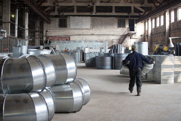 Factory for the manufacture of ventilation pipes.Russian Workshop in the factory for the manufacture of ventilation pipes. Ventilation metal pipes.