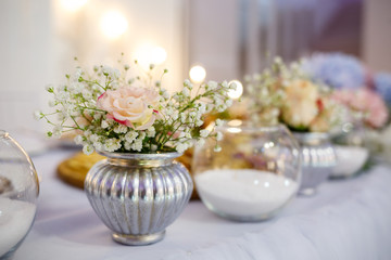 Obraz na płótnie Canvas Wedding table for newlyweds with beautiful decorations