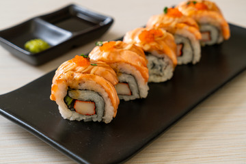 grilled salmon sushi roll with sauce