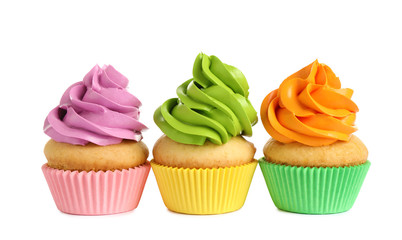 Delicious birthday cupcakes with buttercream on white background