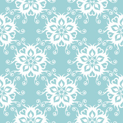 White flowers on blue seamless background. Floral pattern