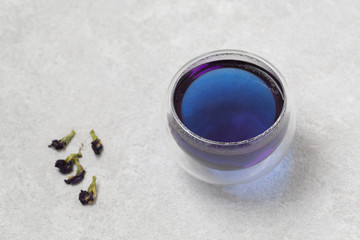 Blue tea Anchan, Clitoria, Butterfly Pea. Cup blue tea. Healthy detox herbal drink.