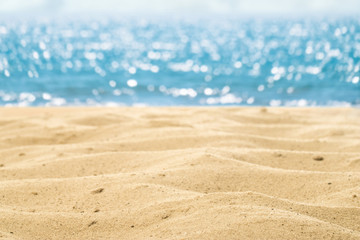 Fototapeta na wymiar Sand beach sea background summer