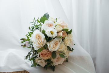 the bride's bouquet is on the edge