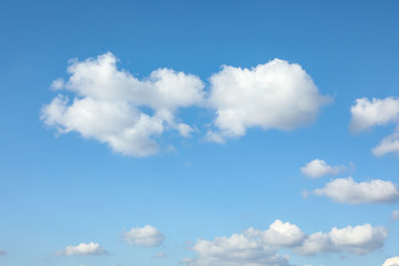 Picturesque view of blue sky with white clouds on sunny day