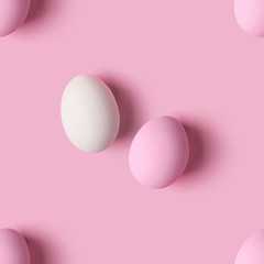 Seamless pattern of Easter eggs over pink background, top view