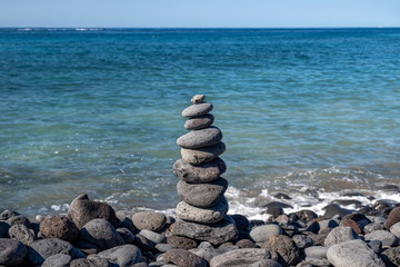 Stack of pebbles on the coast of Adeje Tenerife Spain