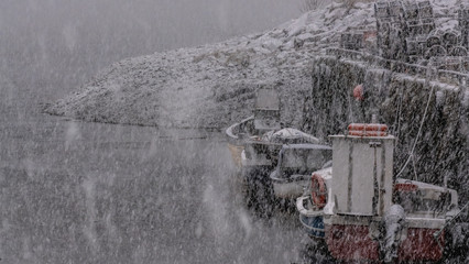 Brora harbour in the Highlands of Scotland during a snow storm