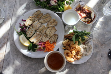 Delicious fish table with calamary