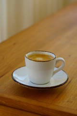 A cup of warm espresso coffee